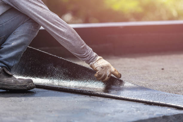 Professional Basement Waterproofing technician working in Harrison, NY